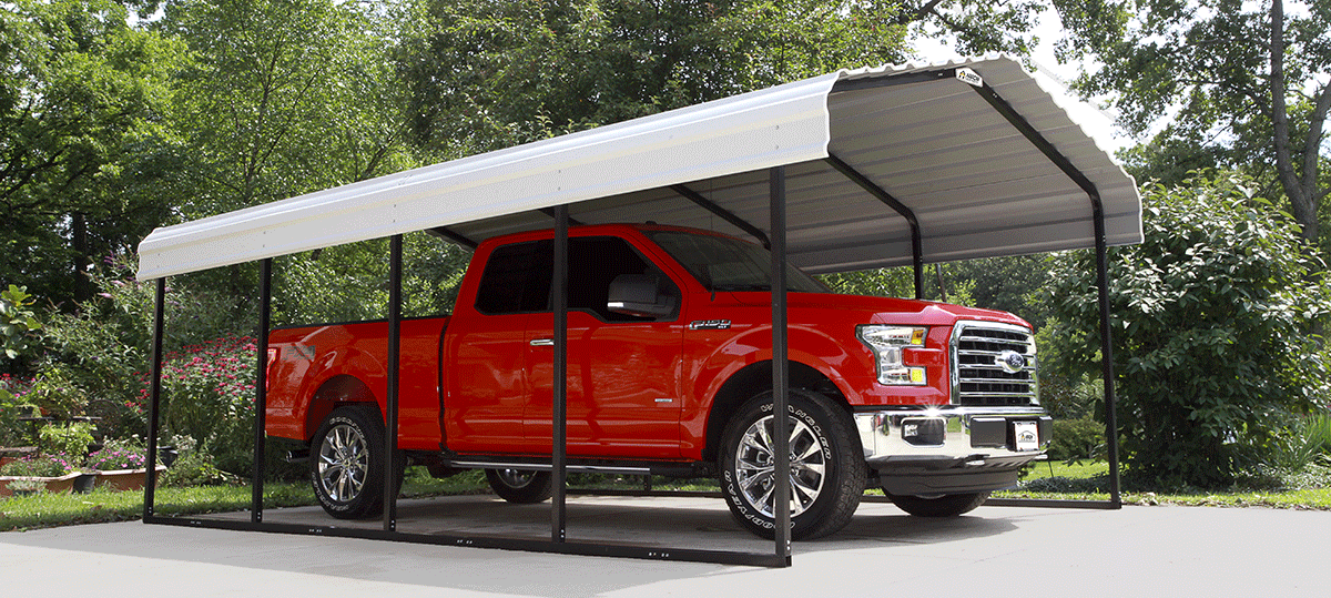 A red truck parked underneath an Arrow Carport