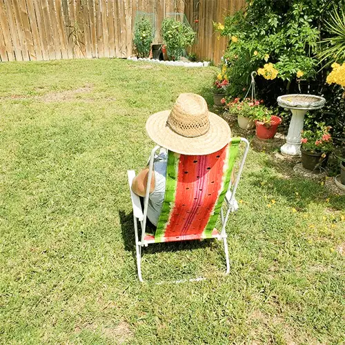 woman sitting on a beach chair
